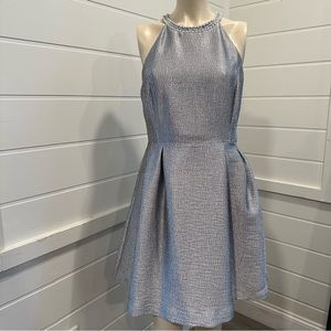 Jennifer Lopez silver halter dress with pearl accents